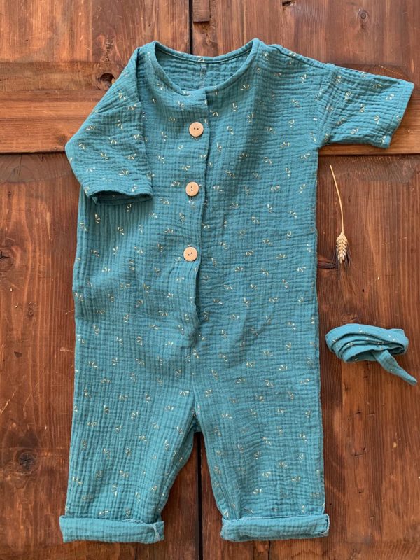 Tuta bambino/a con girocollo e bottoni, in mussolina di cotone doppia garza certificata OEKO-TEX
