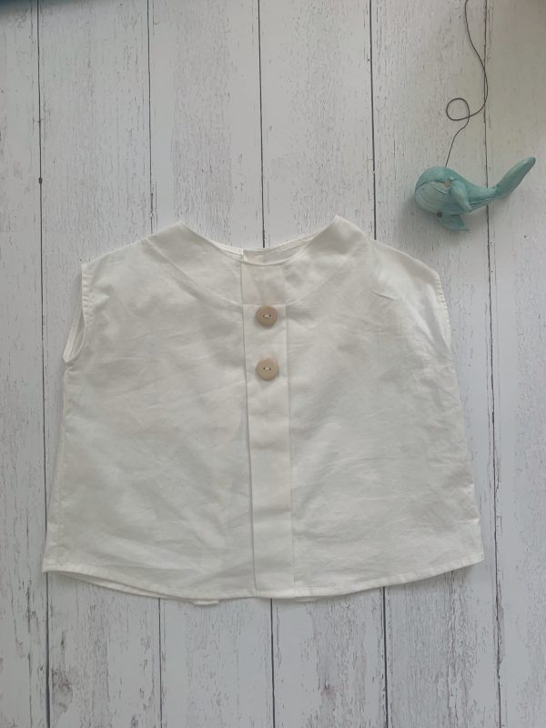 Camicia bambino/a con girocollo e piega davanti, in cotone 100%