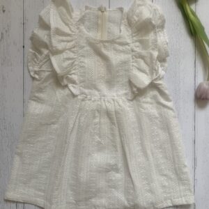 Maglia color écru bambina con girocollo- smanicata con grande rouches , in tessuto di cotone 100% san gallo certificato BCI