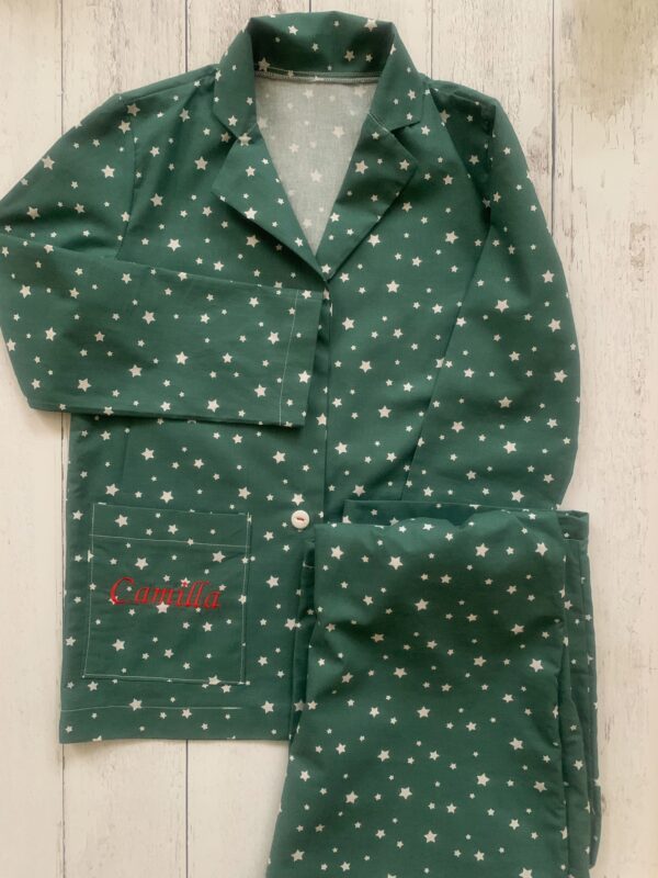 Pigiama natale bambino/a verde scuro con stelle morbidissimo e sacchetto viaggio abbinato in cotone 100%  certificato OEKO-TEX