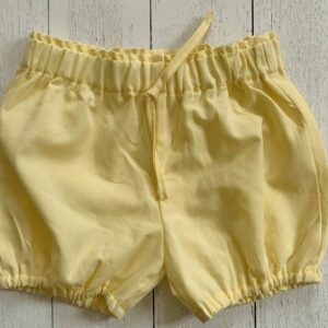 Pantalone corto bloomer giallo in cotone oxford, con elastico in vita e fiocco