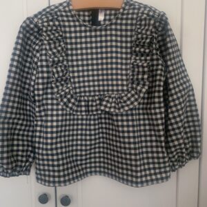 Maglia vichy bianca nera, con decoro rouches in tessuto, girocollo e  manica lunga
